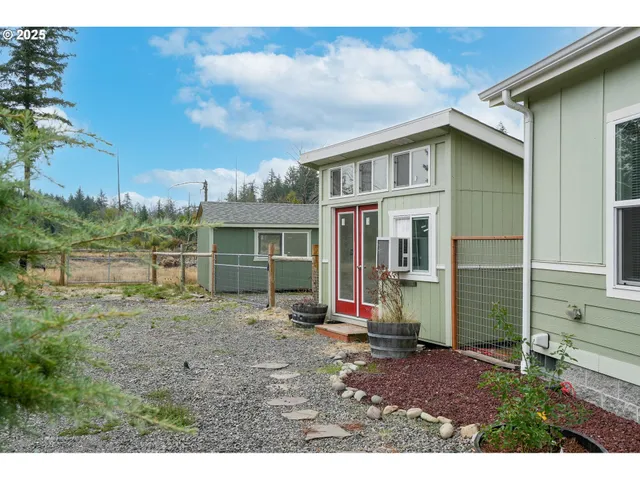 an empty room with windows and entrance