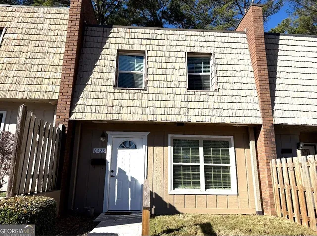 a house view with a outdoor space