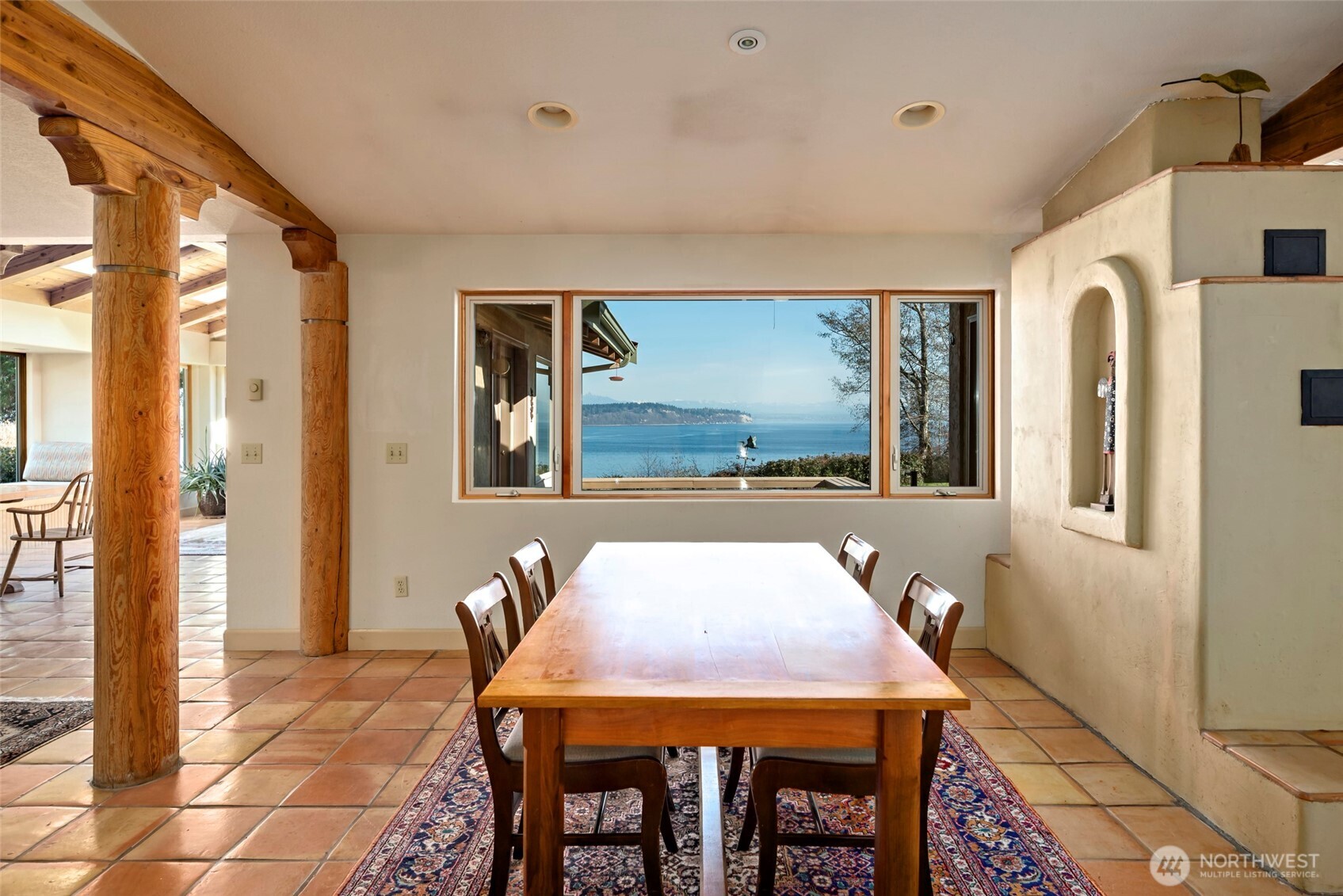 5477 Wilkinson Road Langley, WA 98260 - Photo 17 of 40 a dining room with furniture and window