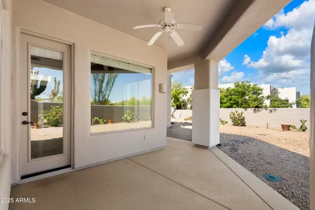 a view of livingroom with furniture and a window