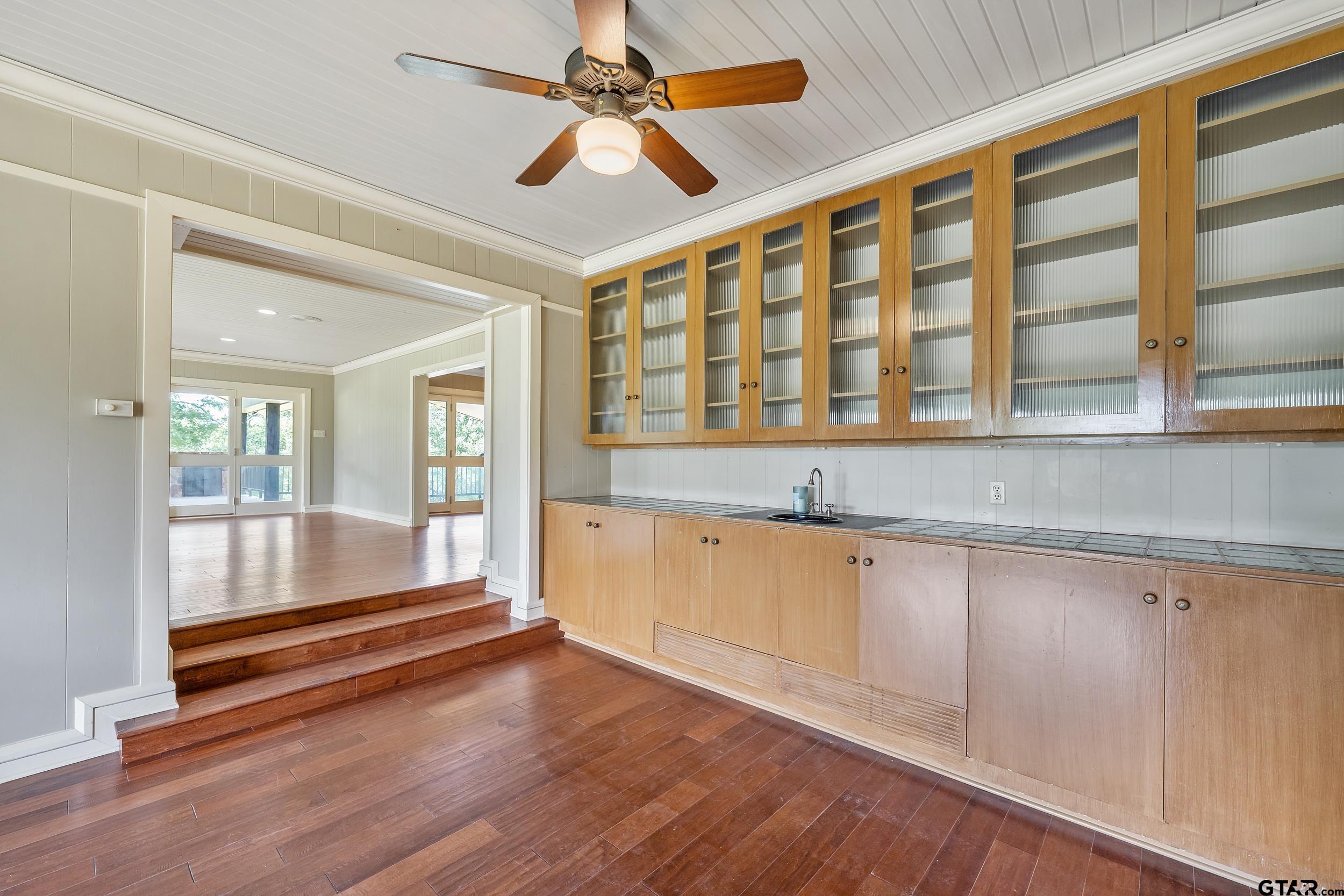 17823 County Road 132 Flint, TX 75762 - Photo 14 of 48 a living room with granite countertop furniture and a ceiling fan