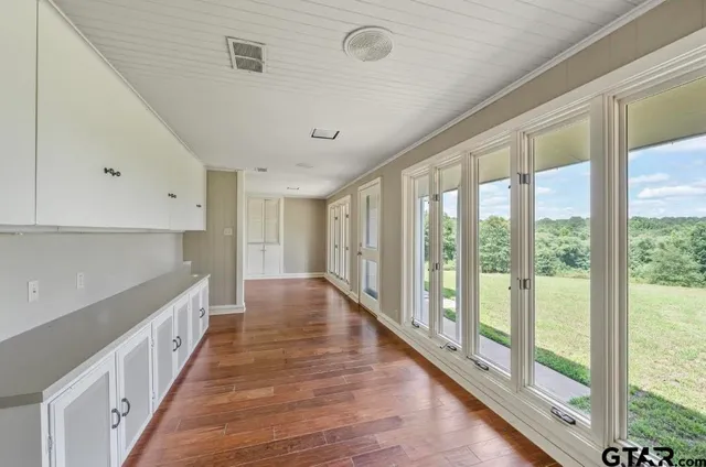 a room with furniture and a window