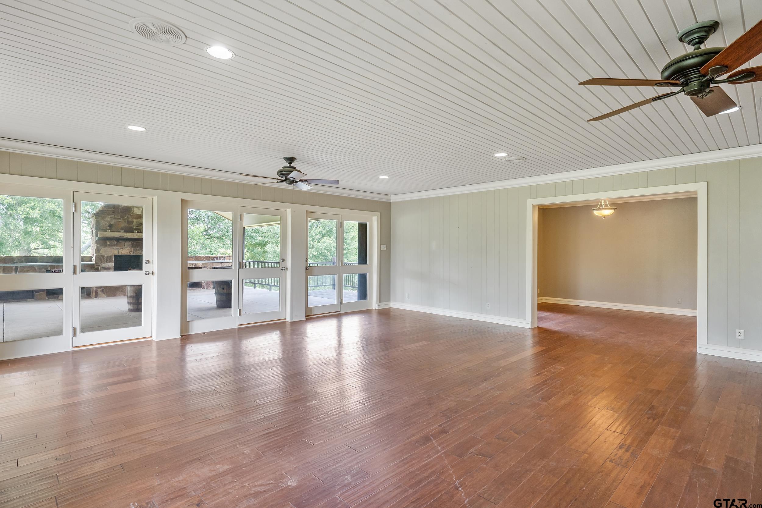 17823 County Road 132 Flint, TX 75762 - Photo 17 of 48 a view of an empty room with wooden floor and a window