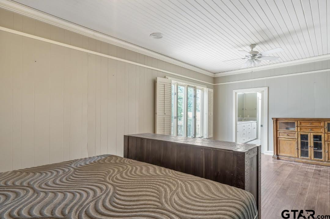 17823 County Road 132 Flint, TX 75762 - Photo 24 of 48 a bedroom with a bed and glass windows