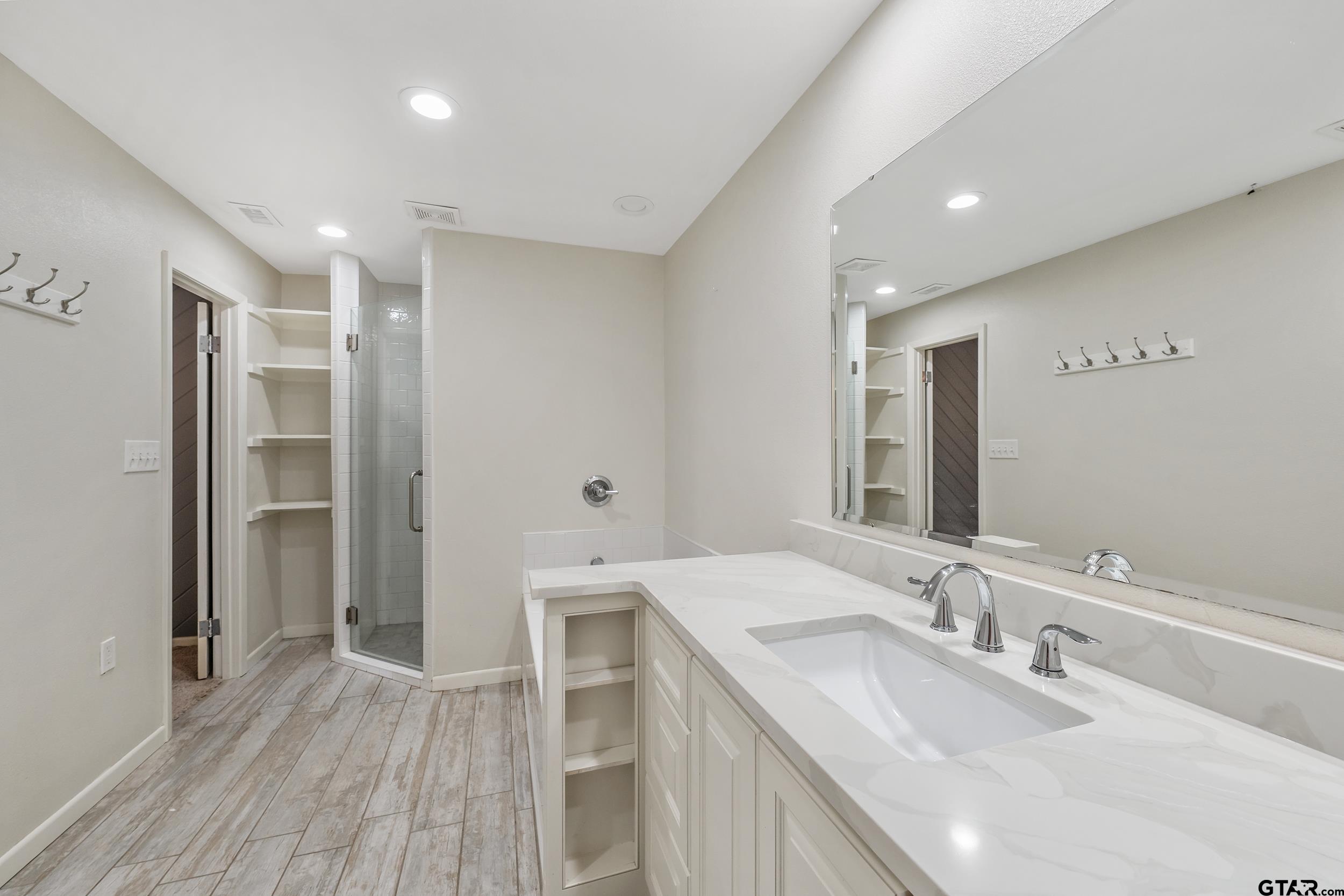 17823 County Road 132 Flint, TX 75762 - Photo 31 of 48 a bathroom with a sink and a mirror