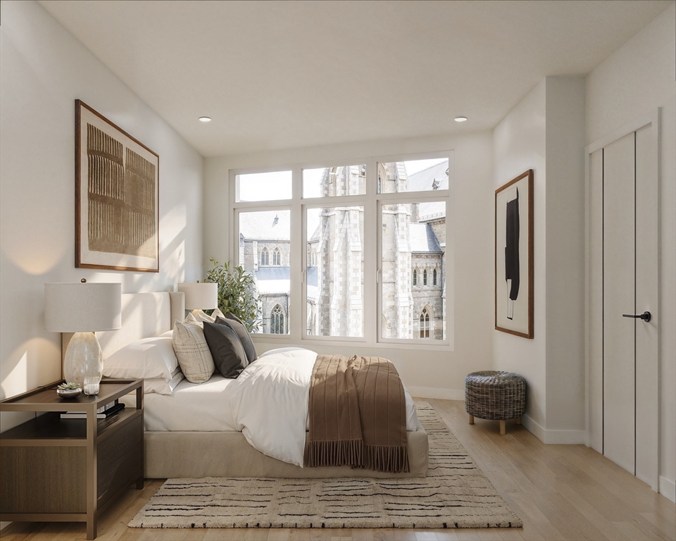 1395 Washington Street, Unit 205 Boston, MA 02118 - Photo 6 of 19 a living room with furniture and a window