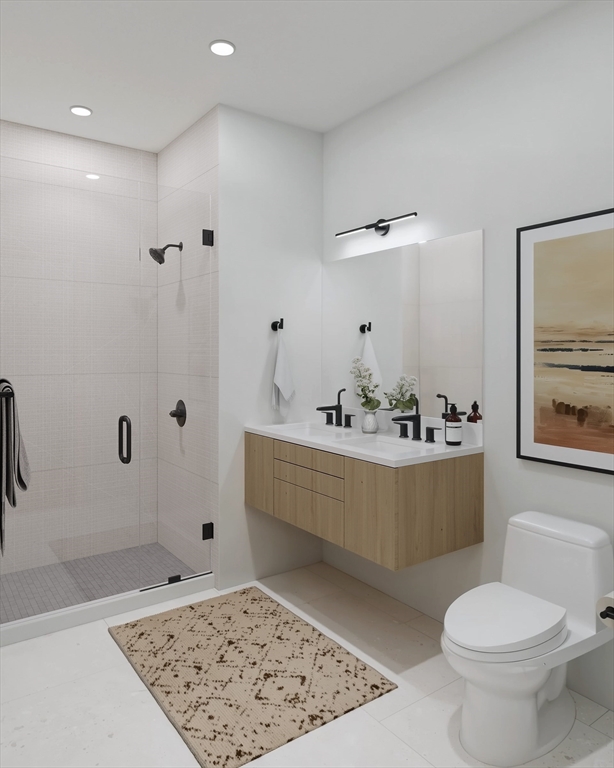 1395 Washington Street, Unit 205 Boston, MA 02118 - Photo 9 of 19 a bathroom with a sink toilet and shower