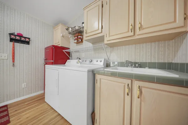 a utility room with dryer and washer