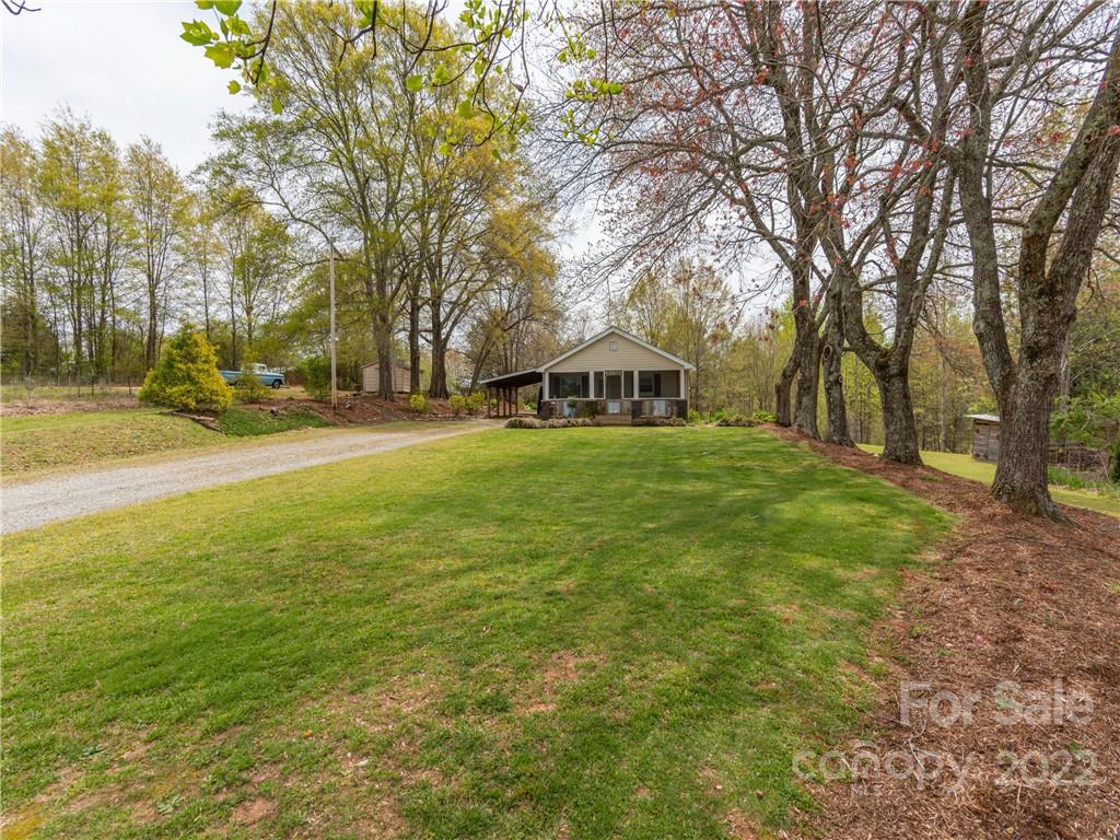 4467 Big Level Road Mill Spring, NC 28756 - Photo 13 of 33 a view of an outdoor space with swimming pool