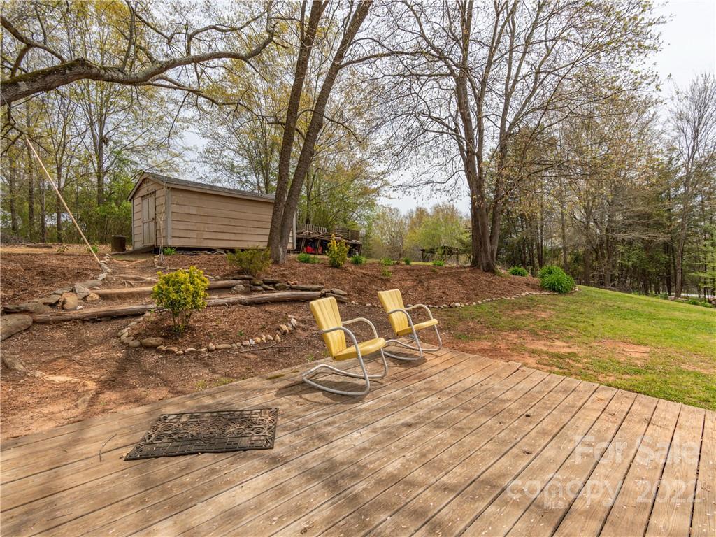 4467 Big Level Road Mill Spring, NC 28756 - Photo 18 of 33 a view of a yard with some trees