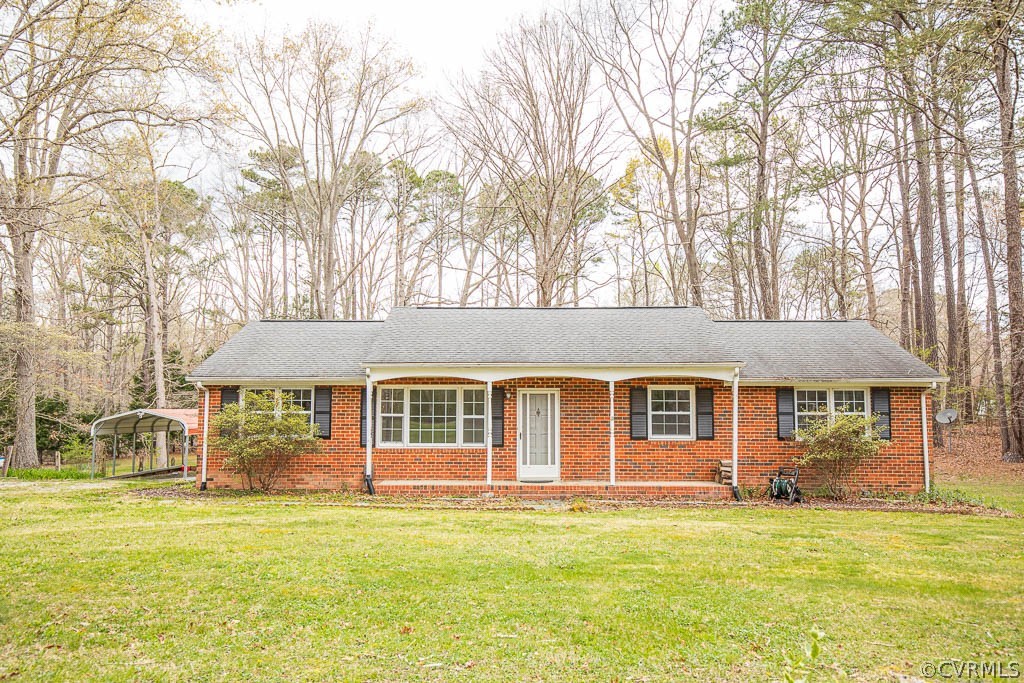 12200 Spring Run Road Chesterfield, VA 23832 - Photo 1 of 20 a front view of a house with a garden
