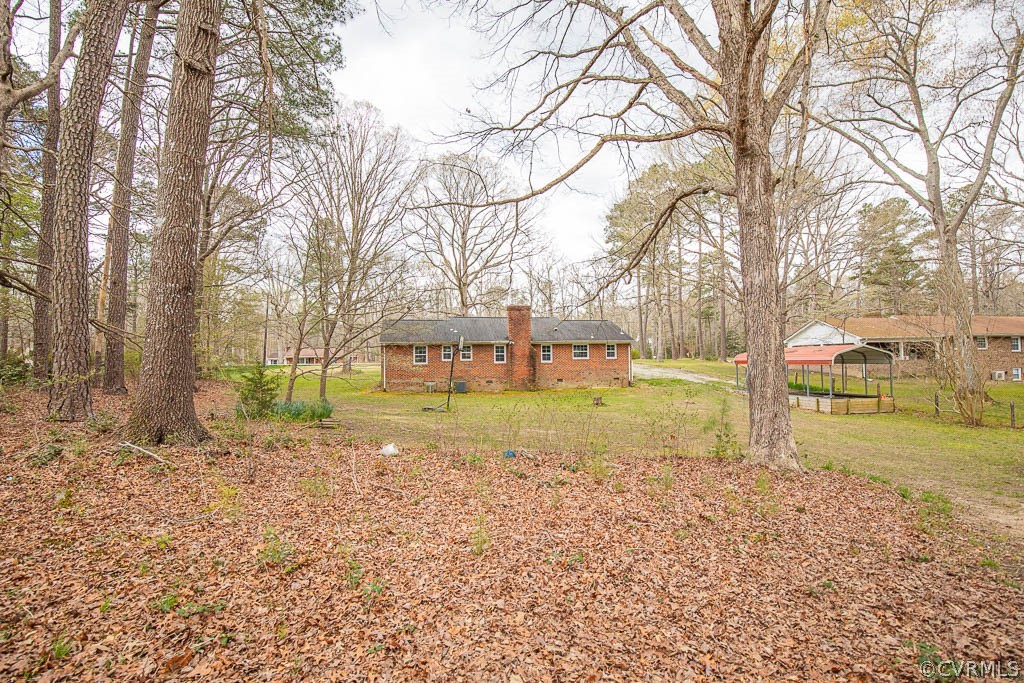 12200 Spring Run Road Chesterfield, VA 23832 - Photo 14 of 20 a view of a house with a yard