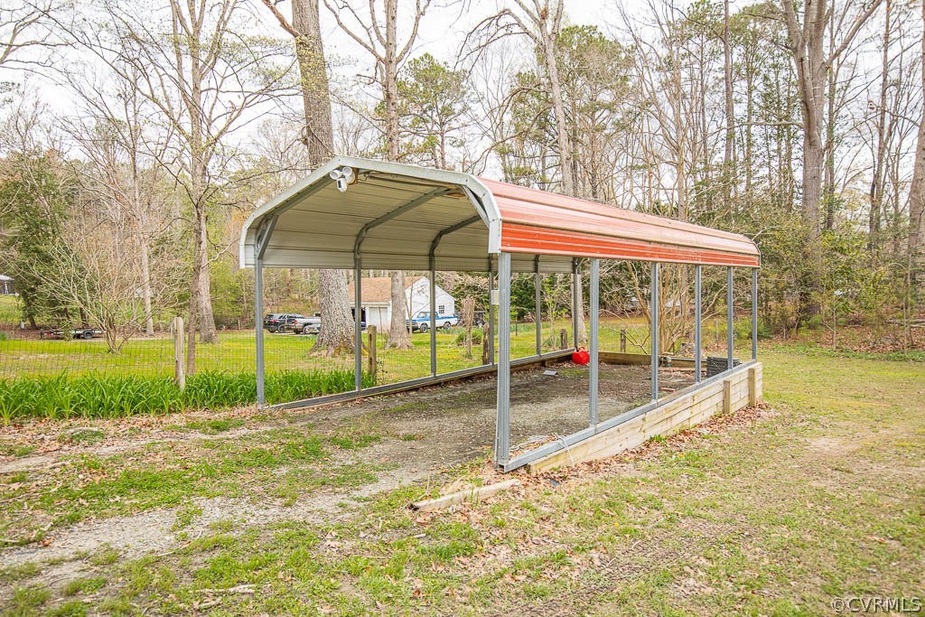 12200 Spring Run Road Chesterfield, VA 23832 - Photo 15 of 20 a view of a playground with a house