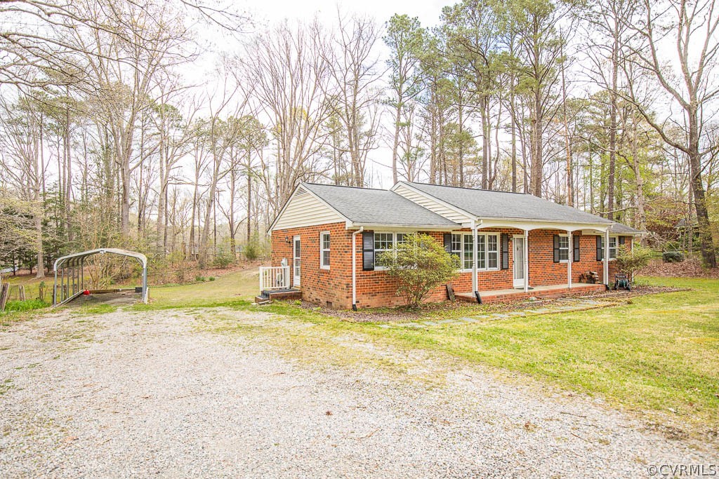 12200 Spring Run Road Chesterfield, VA 23832 - Photo 20 of 20 a front view of a house with swimming pool and porch with furniture