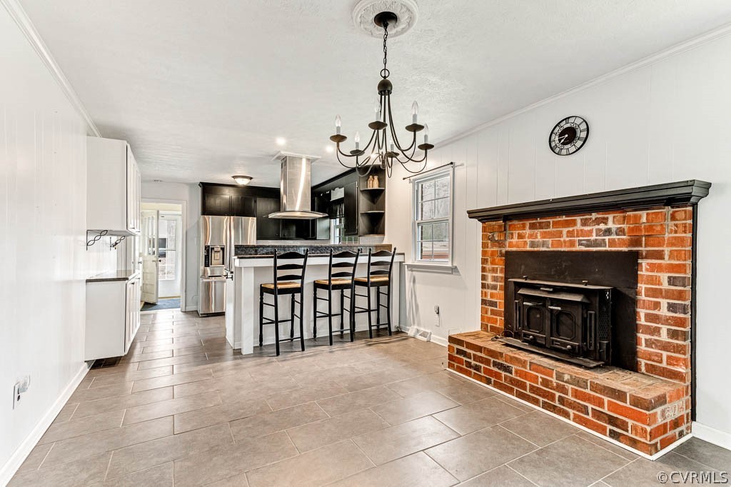 12200 Spring Run Road Chesterfield, VA 23832 - Photo 4 of 20 a open kitchen that has a stove a refrigerator and a fireplace