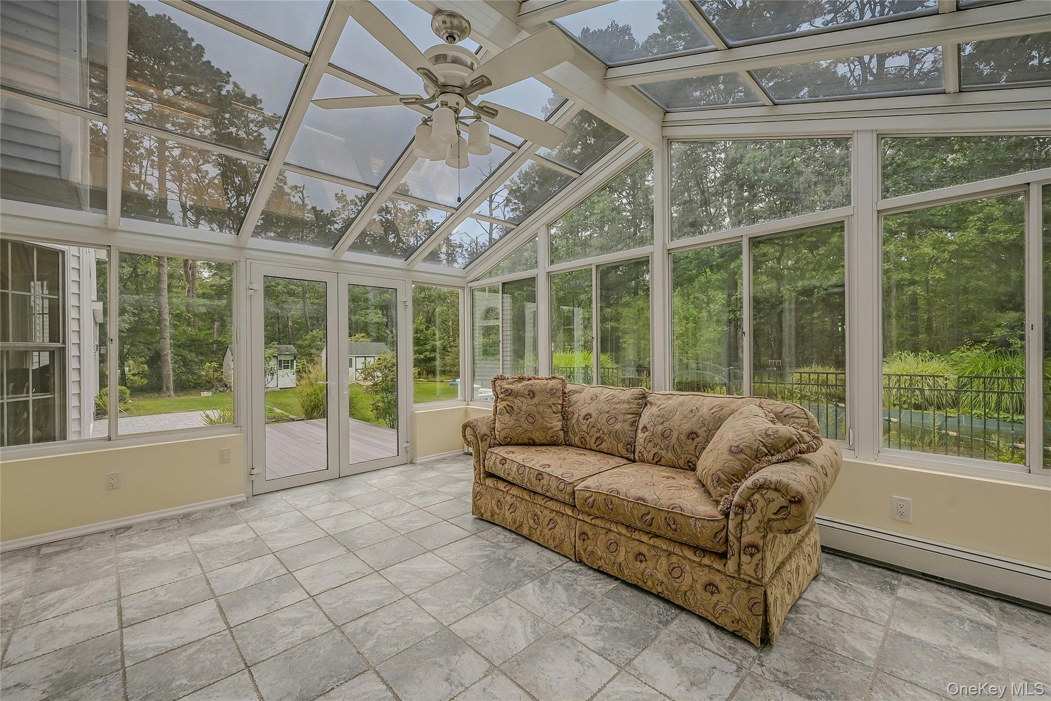 144 S Path Calverton, NY 11933 - Photo 15 of 19 a living room with furniture and large windows