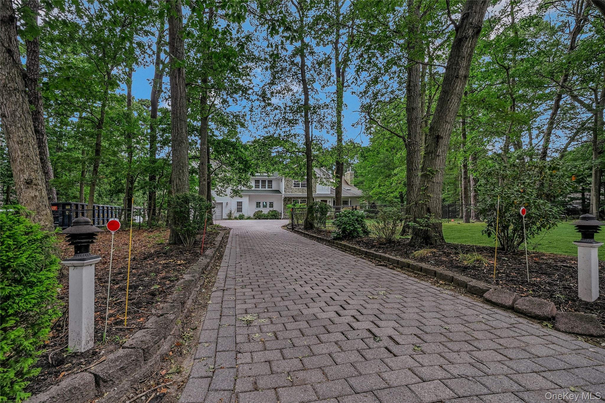 144 S Path Calverton, NY 11933 - Photo 4 of 19 a view of a pathway with a patio