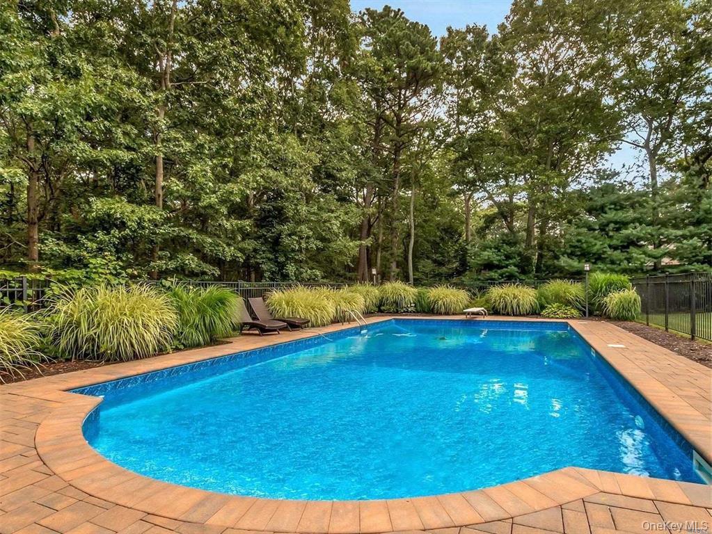 144 S Path Calverton, NY 11933 - Photo 8 of 19 a view of swimming pool with a yard