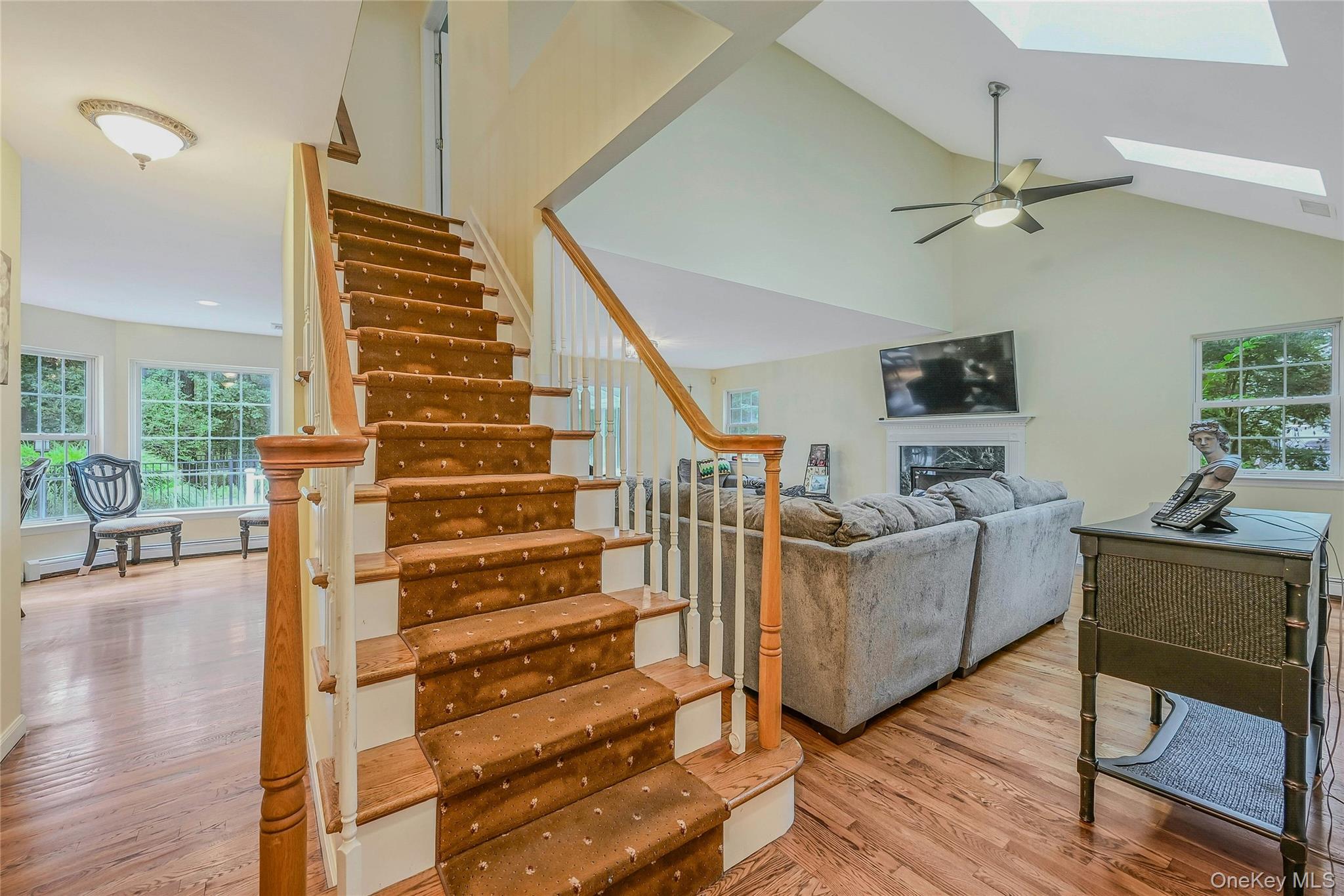 144 S Path Calverton, NY 11933 - Photo 9 of 19 a living room with furniture and wooden floor