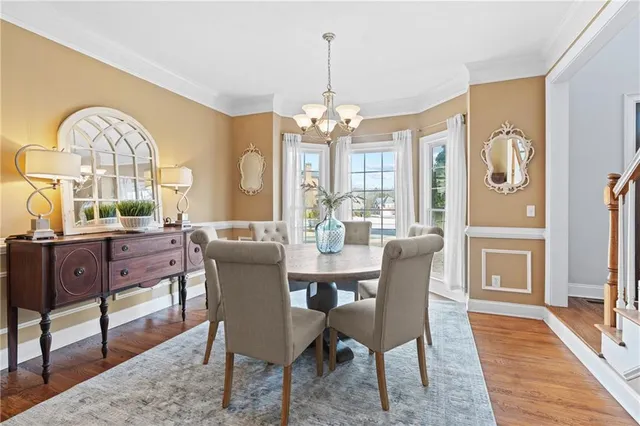 a view of a patio with couches and a fire pit