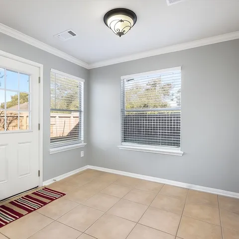 a bathroom with a sink vanity and a mirror