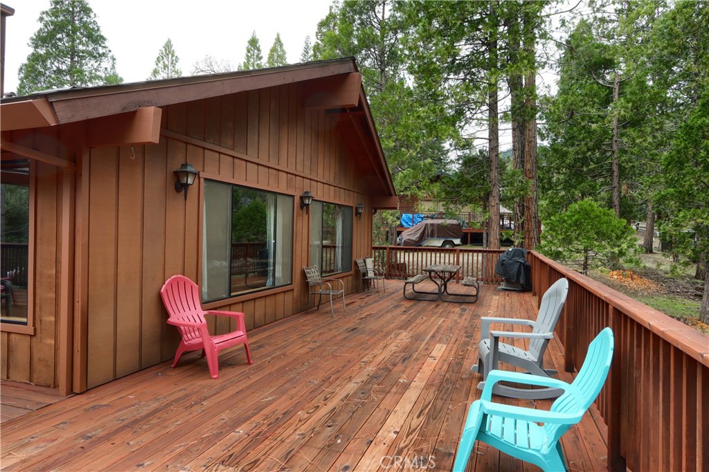 8041 Chilnualna Falls Road Wawona, CA 95389 - Photo 32 of 46 a view of backyard with deck and outdoor seating