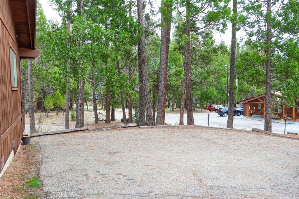 8041 Chilnualna Falls Road Wawona, CA 95389 - Photo 37 of 46 a view of a house with a outdoor space