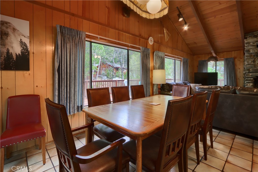 8041 Chilnualna Falls Road Wawona, CA 95389 - Photo 8 of 46 a view of a dining room with furniture window and outside view