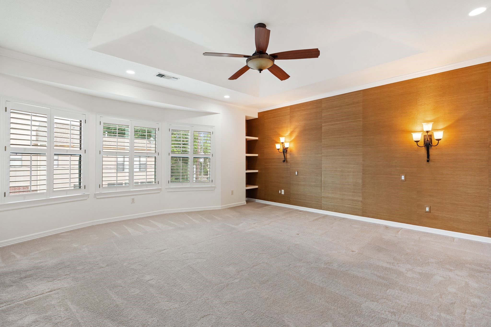 501 Detering Street Houston, TX 77007 - Photo 13 of 44 Welcome to the primary retreat featuring designer grass cloth wall coverings, beautiful bay windows and custom sconces.
