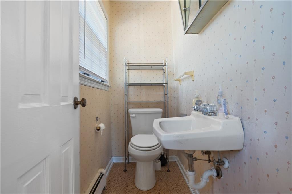 1021 Palm Street Canton, GA 30115 - Photo 13 of 31 a bathroom with a sink toilet and a mirror
