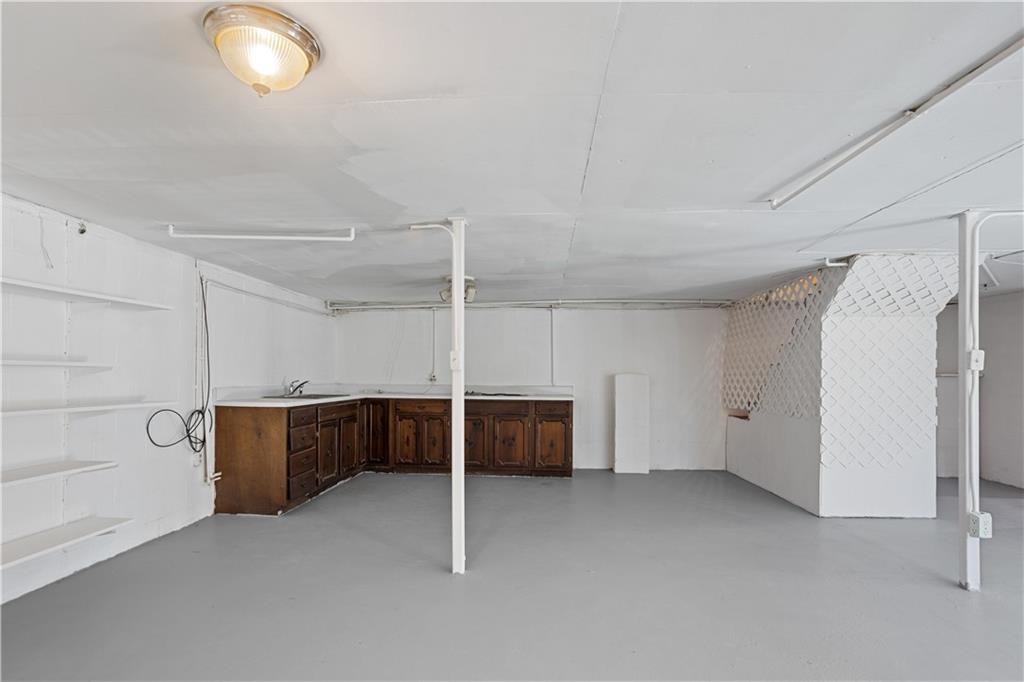 1021 Palm Street Canton, GA 30115 - Photo 21 of 31 a view of an empty room with a fireplace