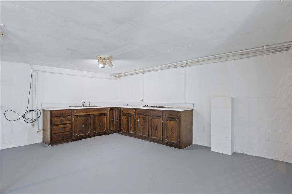 1021 Palm Street Canton, GA 30115 - Photo 23 of 31 a view of a storage & utility room with furniture