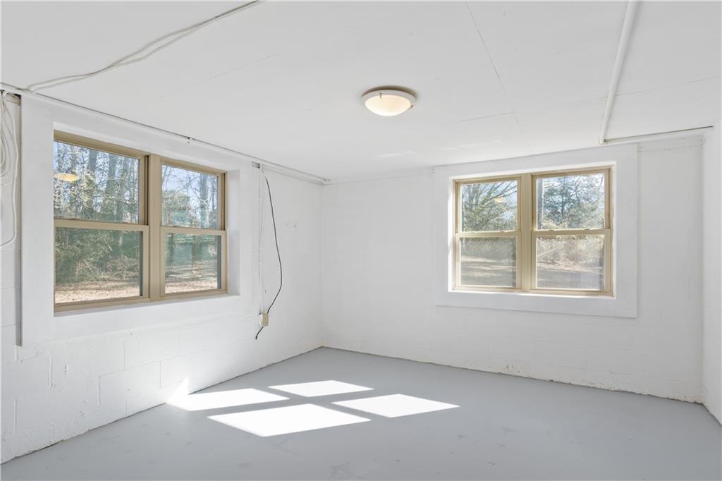 1021 Palm Street Canton, GA 30115 - Photo 24 of 31 a view of an empty room with a window
