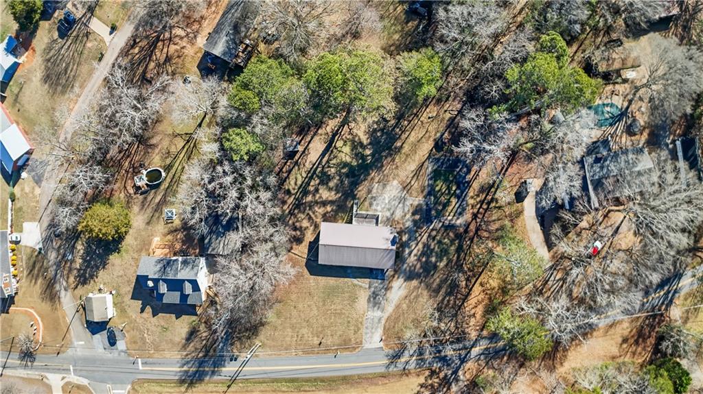 1021 Palm Street Canton, GA 30115 - Photo 31 of 31 an aerial view of a house with a yard