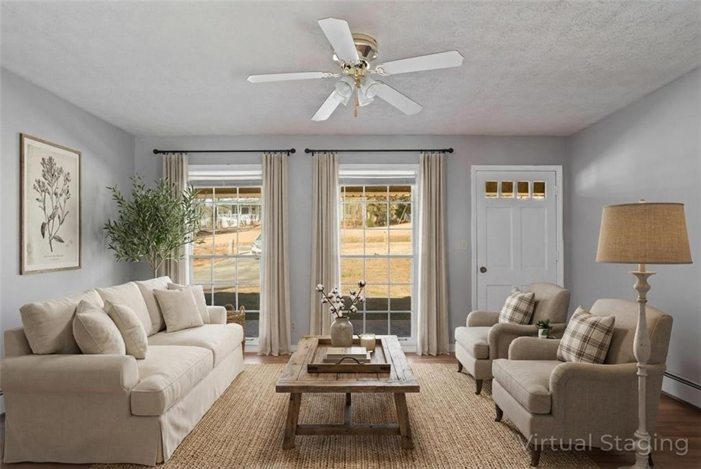 1021 Palm Street Canton, GA 30115 - Photo 4 of 31 a living room with furniture and a large window
