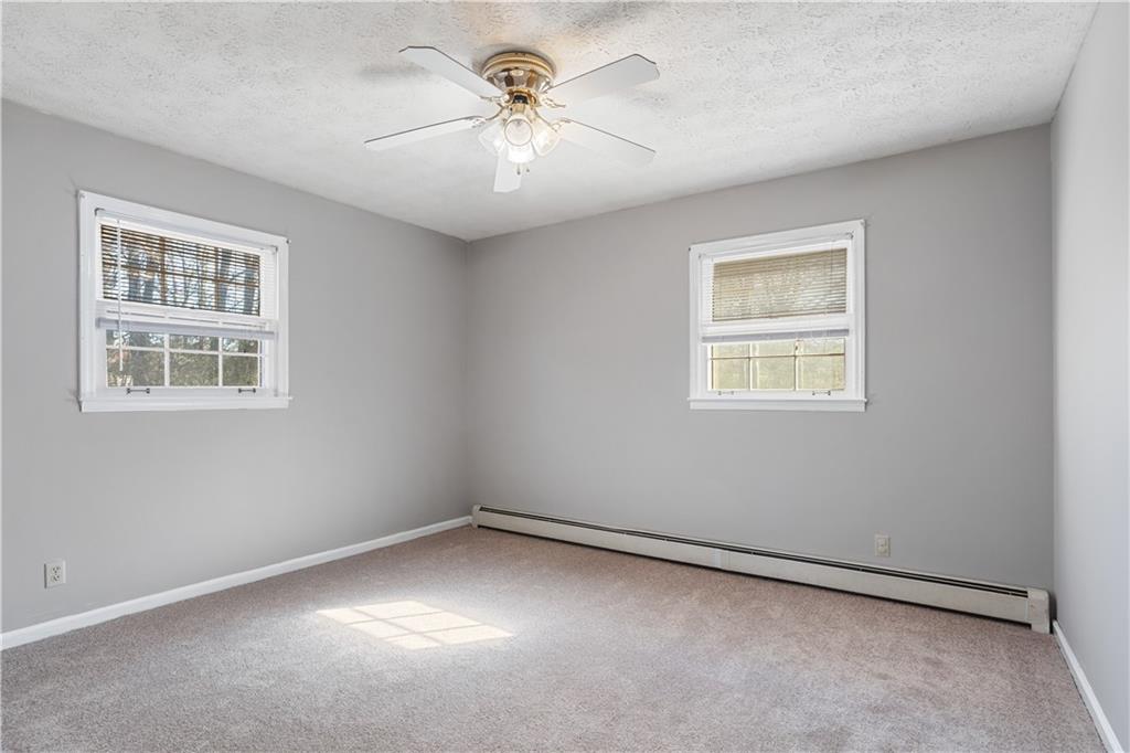 1021 Palm Street Canton, GA 30115 - Photo 8 of 31 a view of an empty room with a window