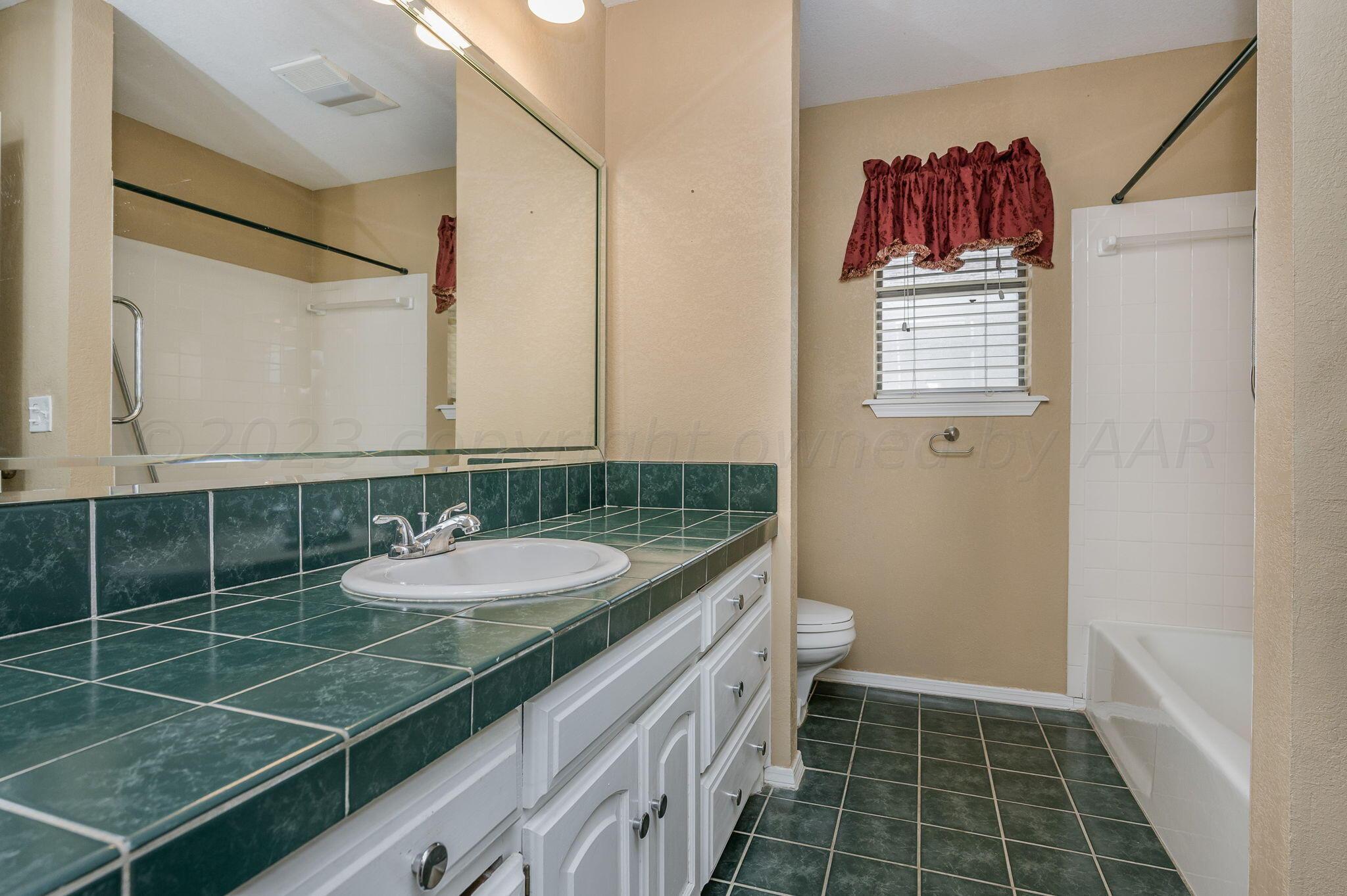 6407 Drexel Road Amarillo, TX 79109 - Photo 13 of 17 Master Bathroom