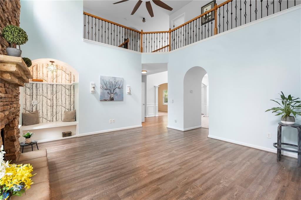 202 Reserve Crossing Canton, GA 30115 - Photo 13 of 56 a view of entryway and hall with wooden floor