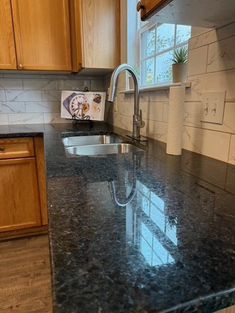 202 Reserve Crossing Canton, GA 30115 - Photo 15 of 56 a kitchen with a sink and a stove