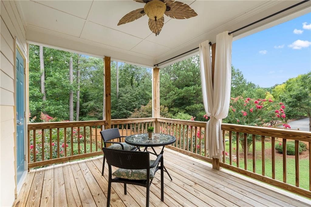 202 Reserve Crossing Canton, GA 30115 - Photo 49 of 56 a view of a two chairs in the deck