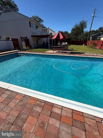 a view of swimming pool from a balcony