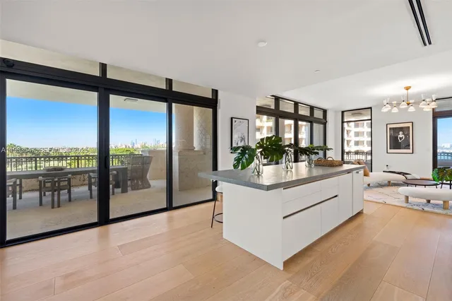 a bed room with a bed and a chair