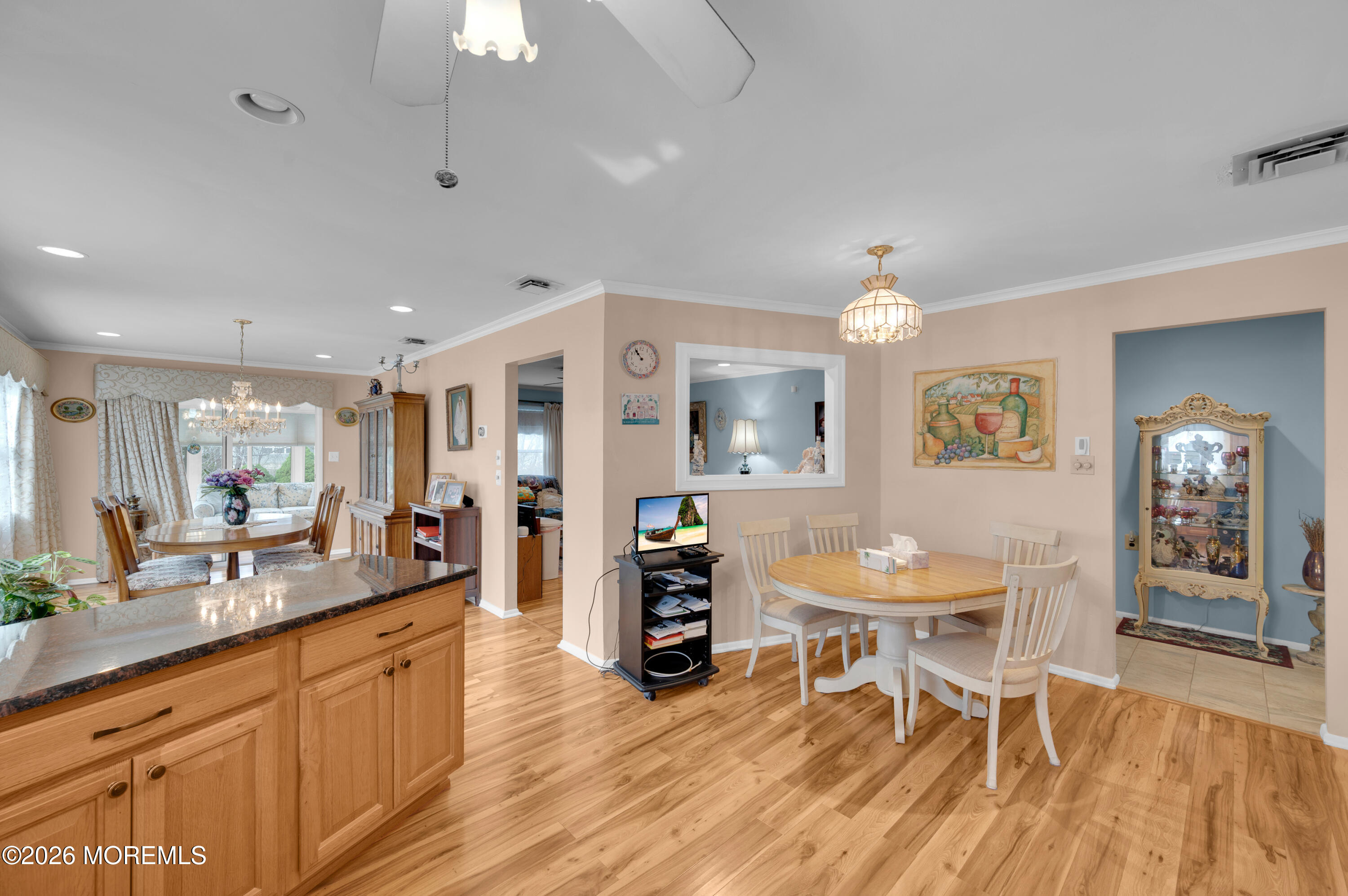 46 Baser Lane Brick, NJ 08724 - Photo 11 of 31 a large kitchen with a table and chairs