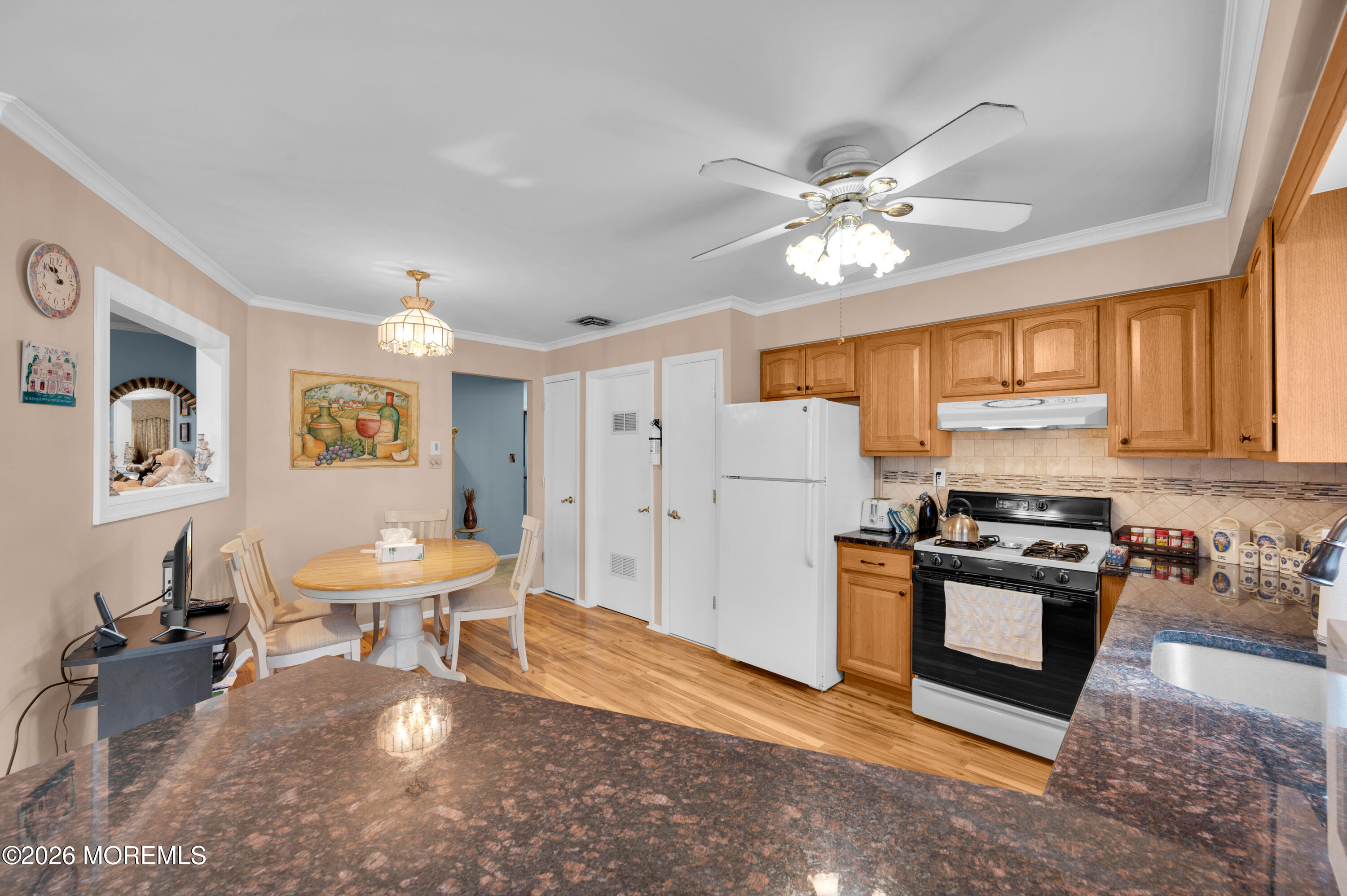 46 Baser Lane Brick, NJ 08724 - Photo 12 of 31 a kitchen with a stove a refrigerator and a sink