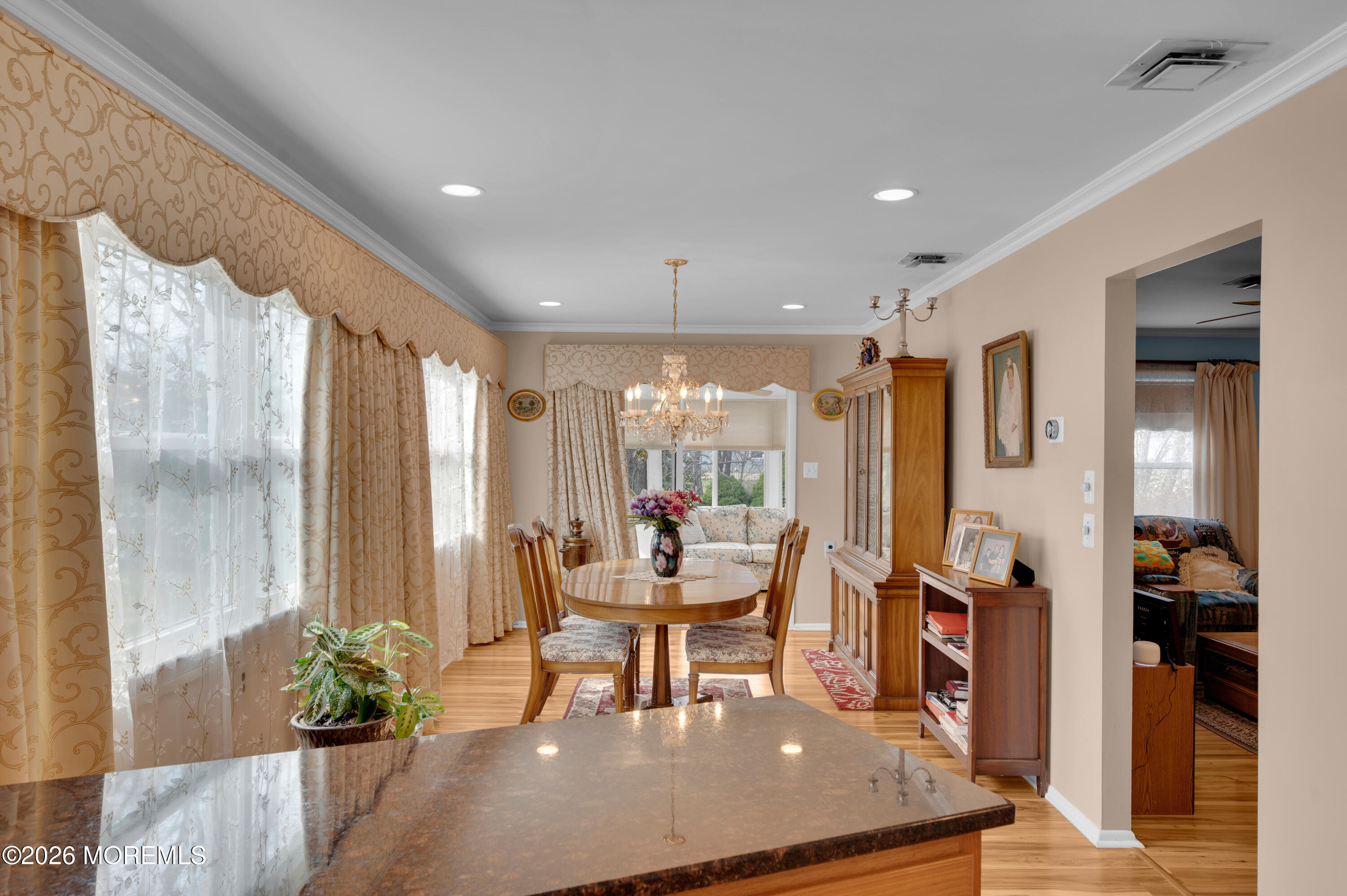46 Baser Lane Brick, NJ 08724 - Photo 14 of 31 a dining room with furniture and wooden floor