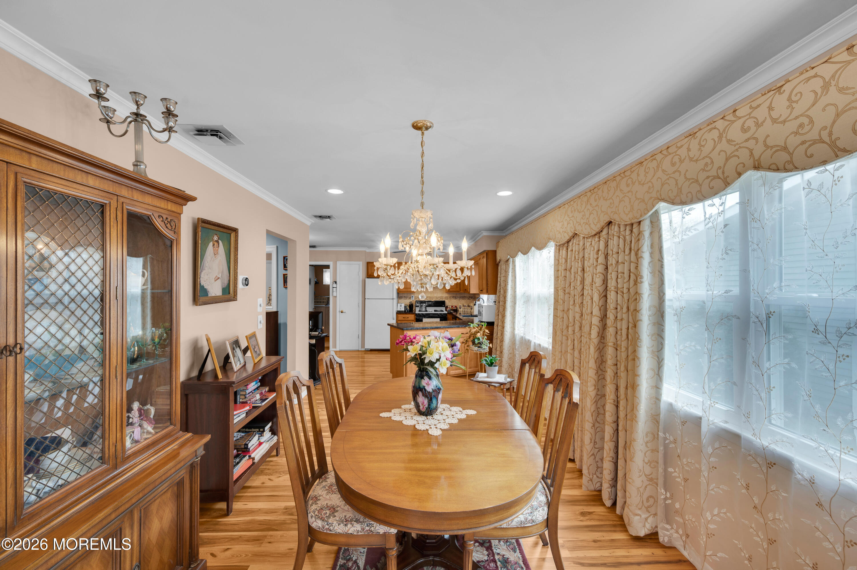 46 Baser Lane Brick, NJ 08724 - Photo 17 of 31 a view of a dining room with furniture window and wooden floor