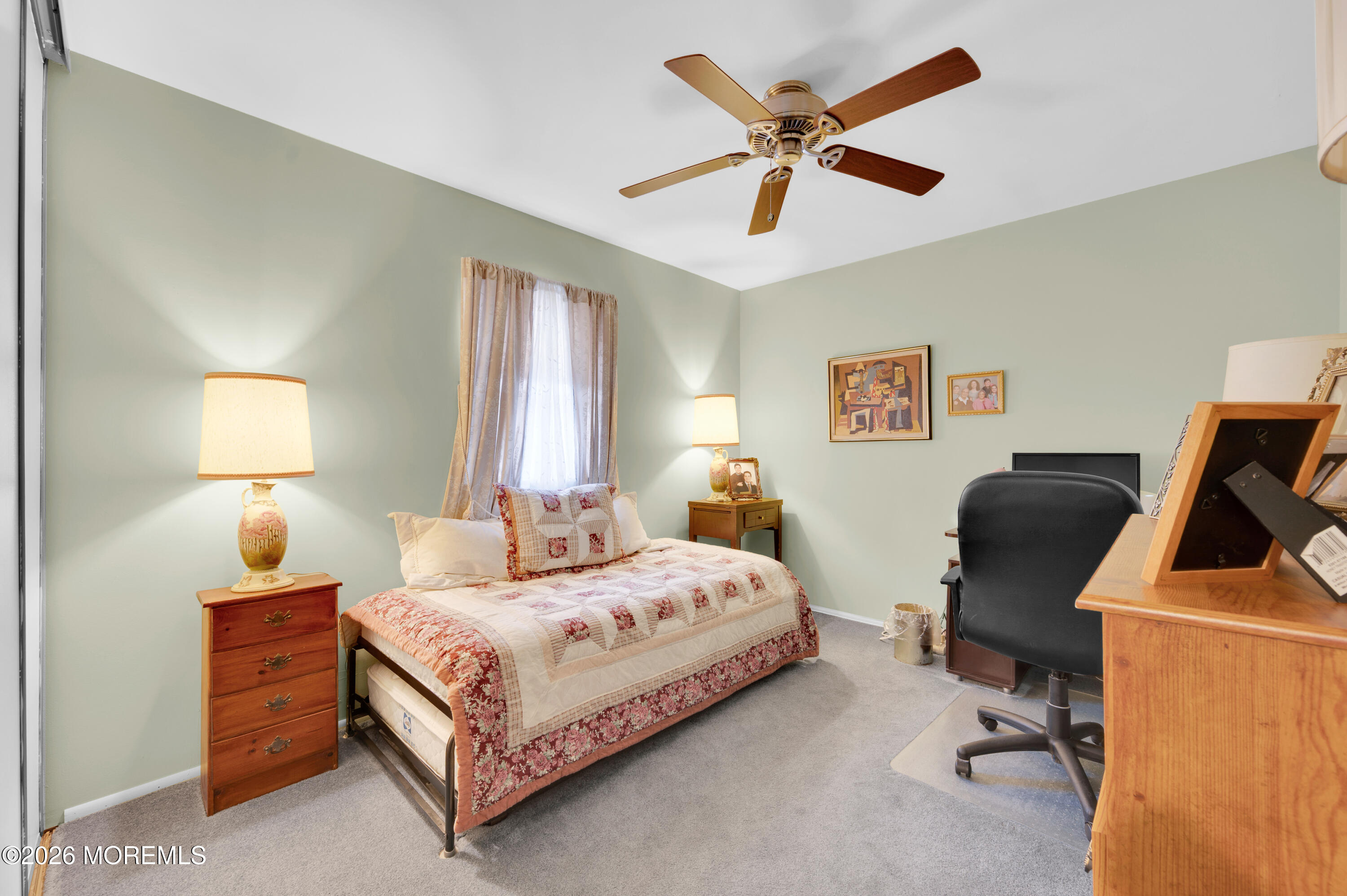 46 Baser Lane Brick, NJ 08724 - Photo 22 of 31 a bedroom with a bed a desk and chair next to a window