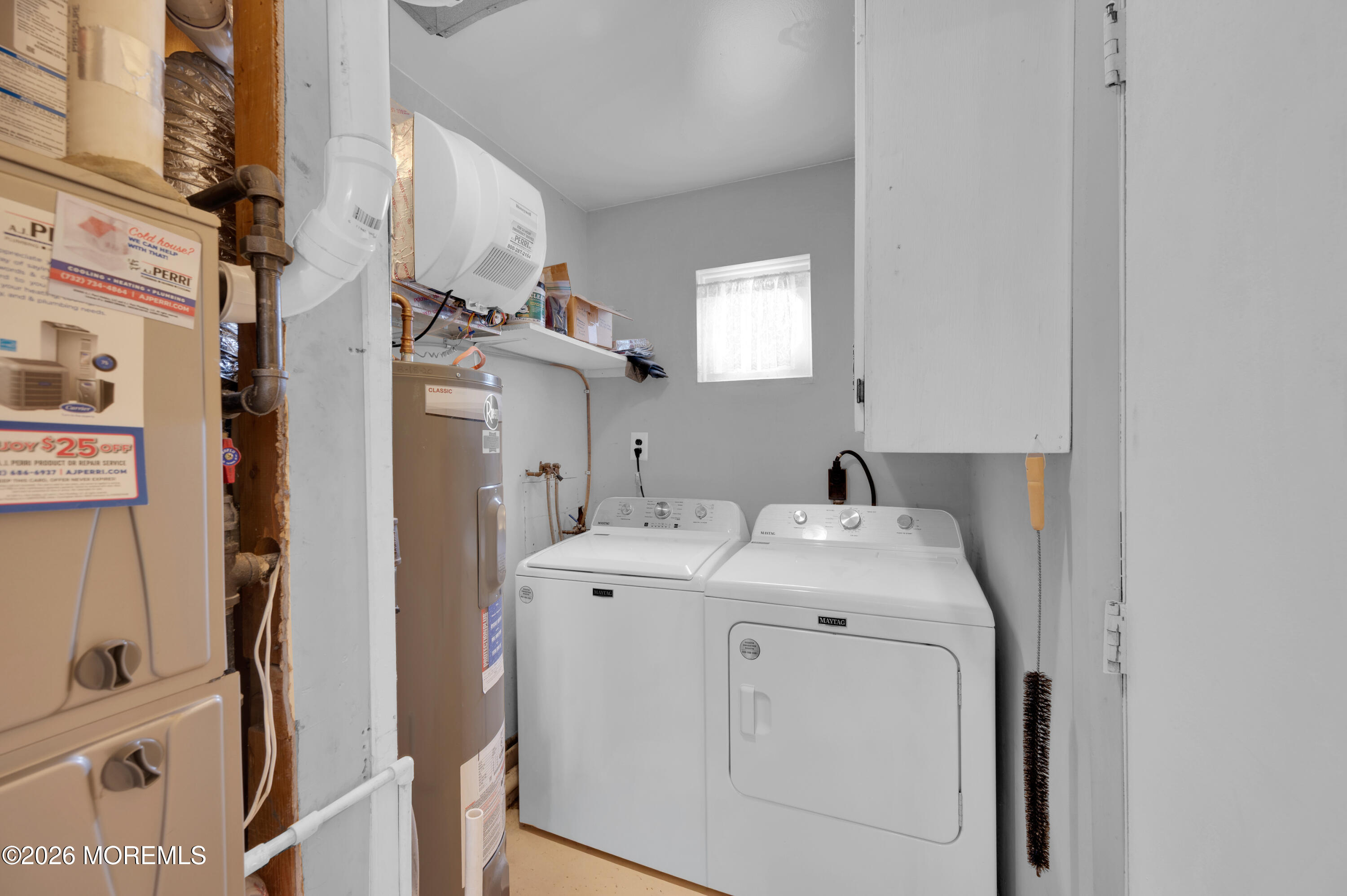 46 Baser Lane Brick, NJ 08724 - Photo 30 of 31 a utility room with dryer and washer