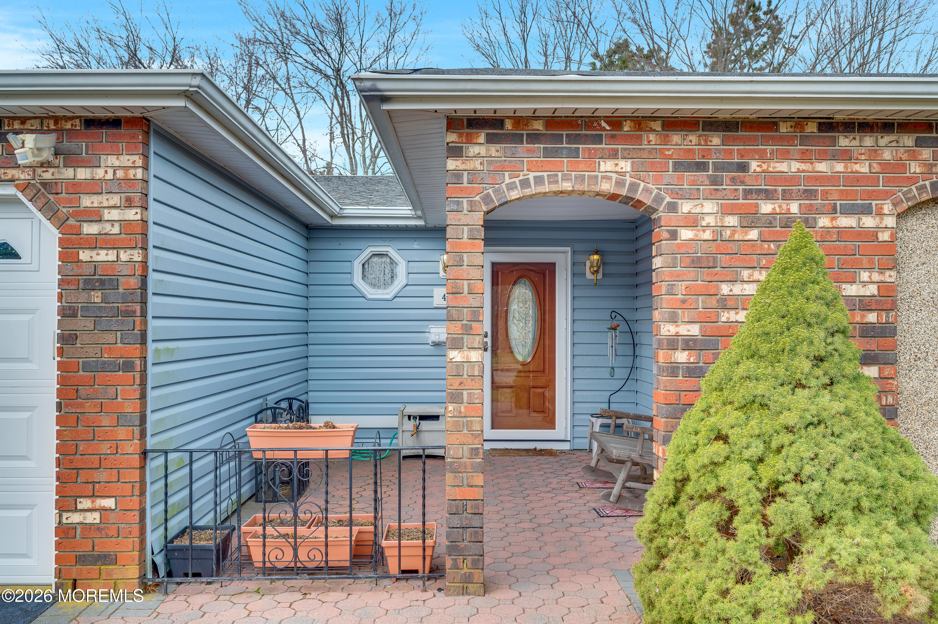 46 Baser Lane Brick, NJ 08724 - Photo 3 of 31 a front view of a house with garden