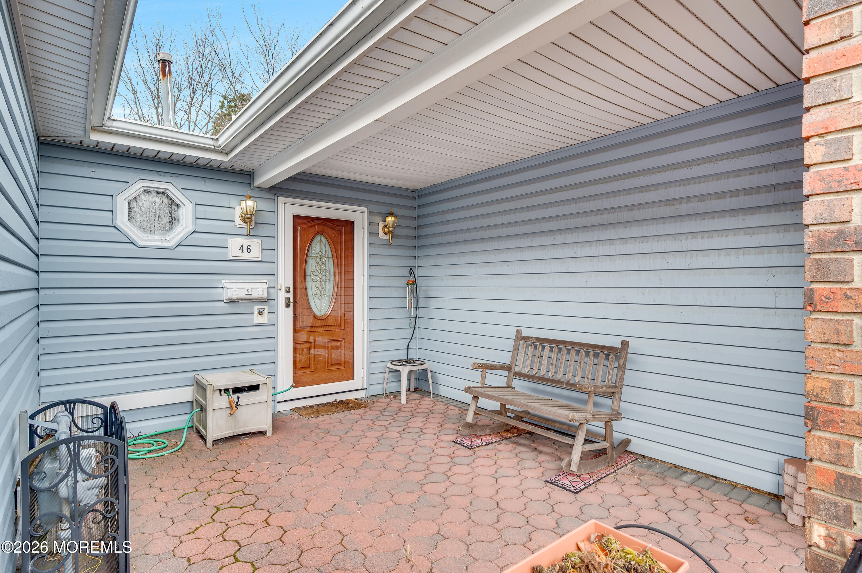 46 Baser Lane Brick, NJ 08724 - Photo 4 of 31 a backyard of a house with seating space